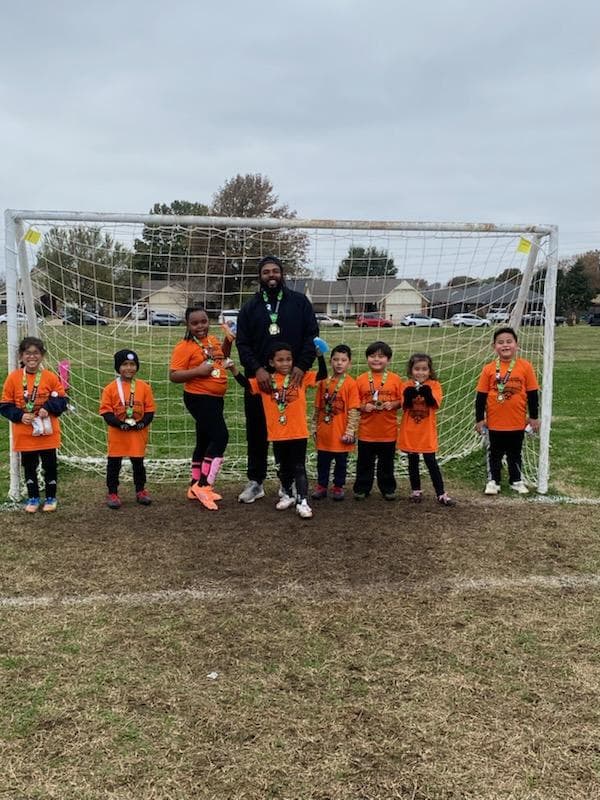 Devonce Lennix coaching youth soccer players in Tulsa, Oklahoma